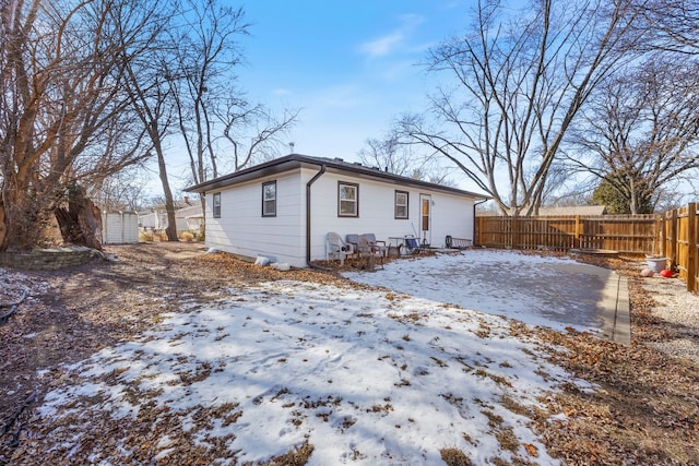 view of snow covered property