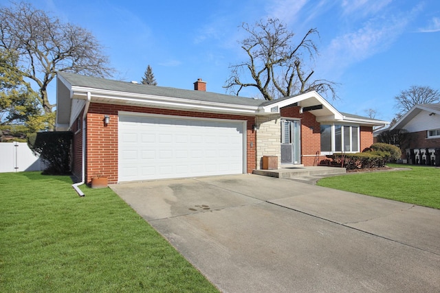 single story home featuring a garage and a front yard