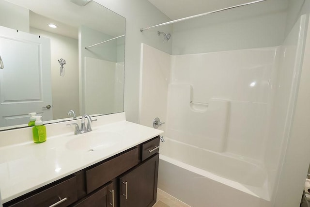 bathroom featuring vanity and bathing tub / shower combination