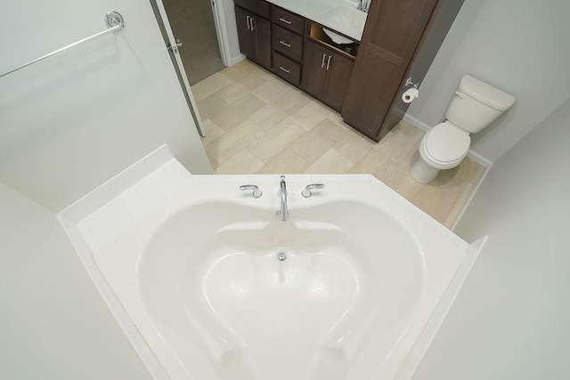 bathroom featuring sink and toilet