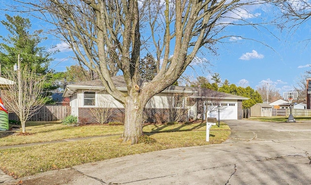 ranch-style house with a garage and a front yard