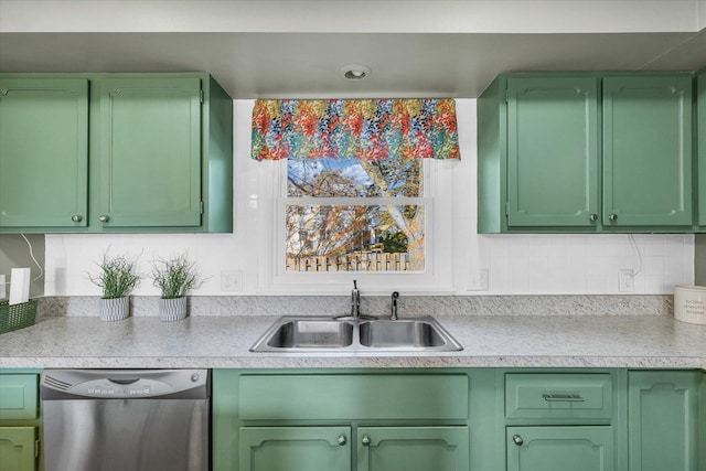 kitchen featuring sink, green cabinetry, and dishwasher