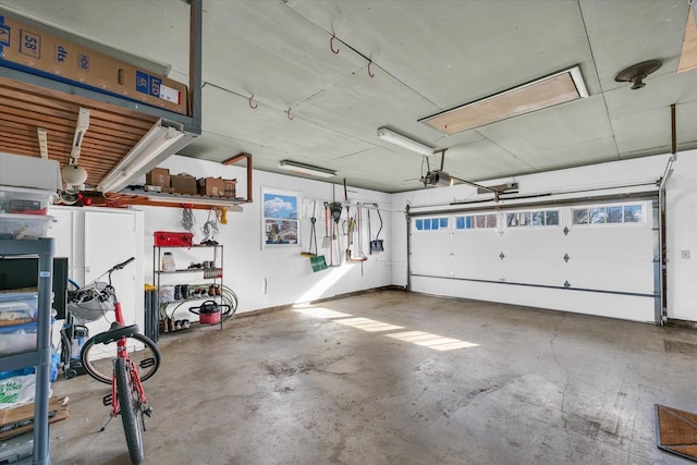 garage featuring a garage door opener