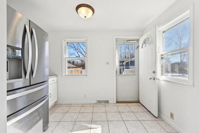 939 N Grace St, Lombard, IL 60148 - doorway to outside featuring light tile patterned floors