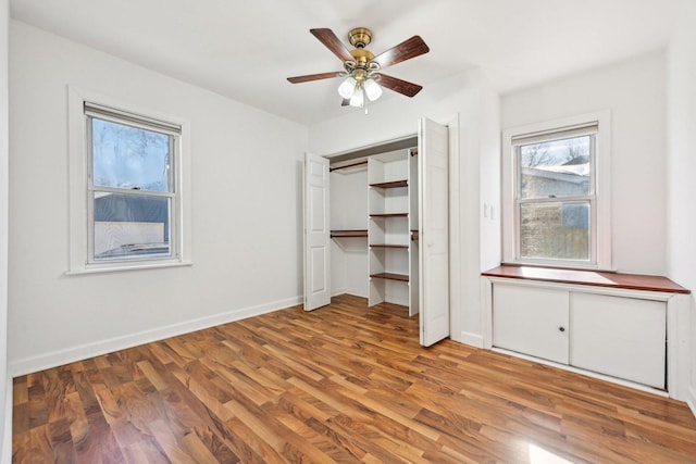 939 N Grace St, Lombard, IL 60148 - unfurnished bedroom with wood-type flooring and ceiling fan