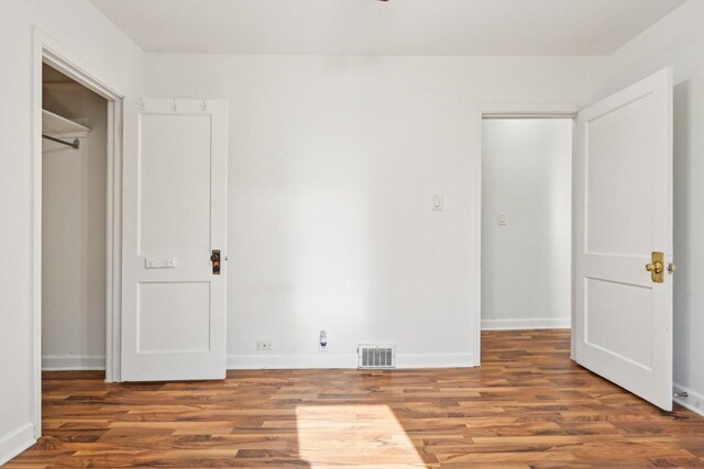939 N Grace St, Lombard, IL 60148 - unfurnished bedroom with wood-type flooring