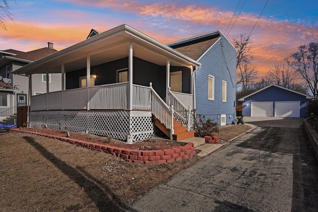 939 N Grace St, Lombard, IL 60148 - view of front of property featuring an outbuilding, a garage, and covered porch