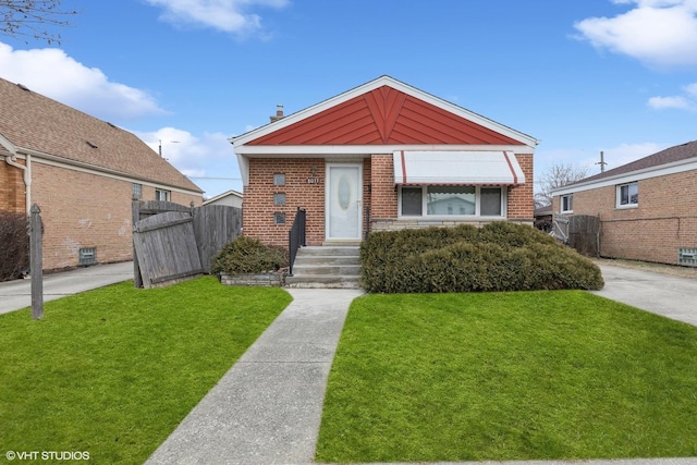 bungalow-style home featuring a front yard and central air condition unit