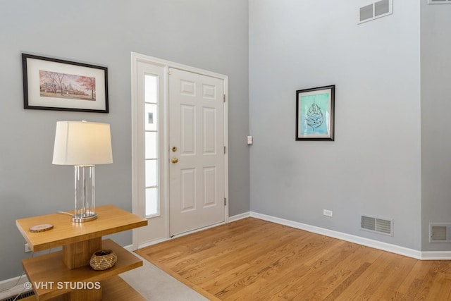 foyer with hardwood / wood-style floors