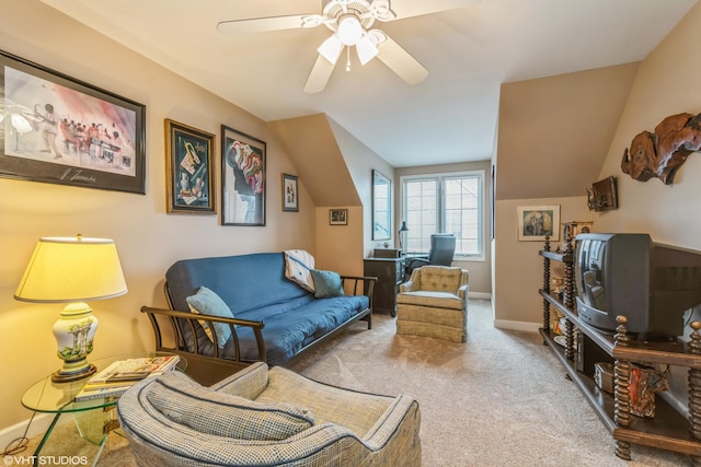 carpeted living room featuring lofted ceiling and ceiling fan