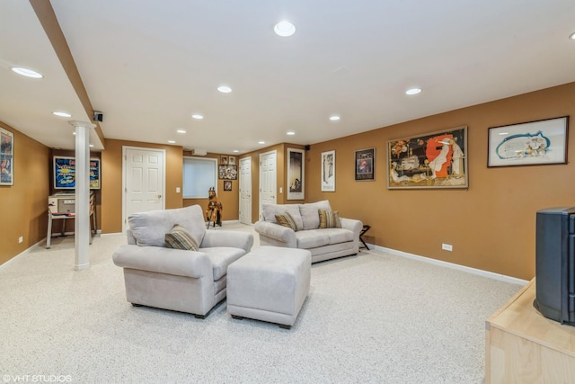 living room featuring carpet floors and ornate columns