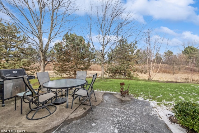 view of patio featuring a grill