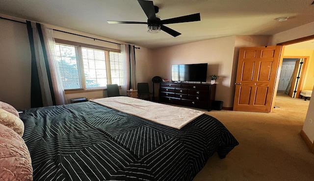 bedroom with light carpet, lofted ceiling, and ceiling fan