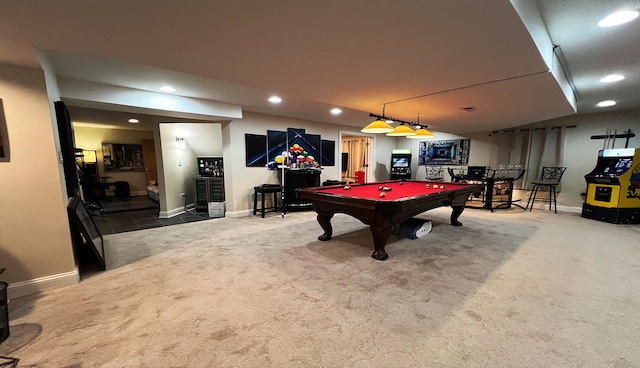 game room featuring pool table, bar, and carpet flooring