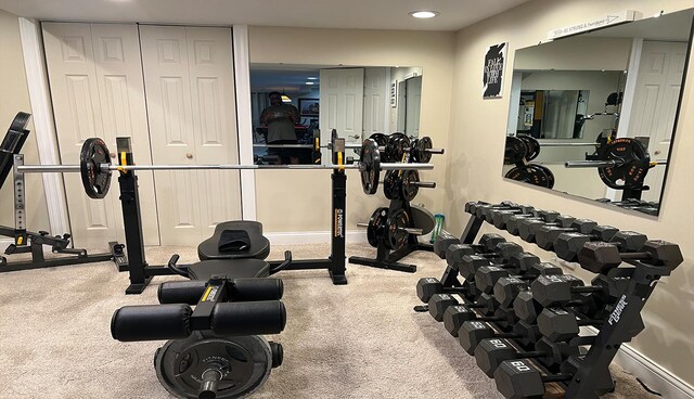 workout area featuring carpet