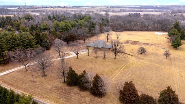 birds eye view of property with a rural view