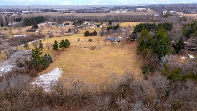 birds eye view of property featuring a rural view