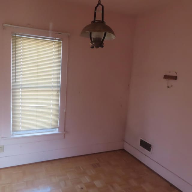 interior space with light parquet flooring