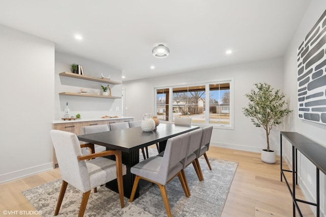 dining room with light hardwood / wood-style flooring