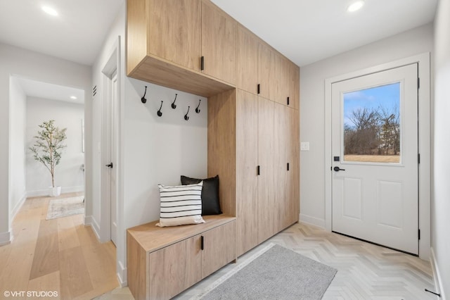 mudroom with light parquet flooring