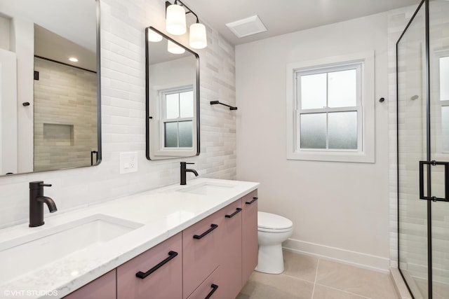 bathroom with decorative backsplash, tile patterned flooring, vanity, toilet, and a shower with door