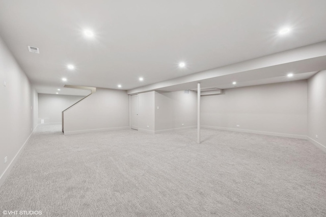 basement with light carpet