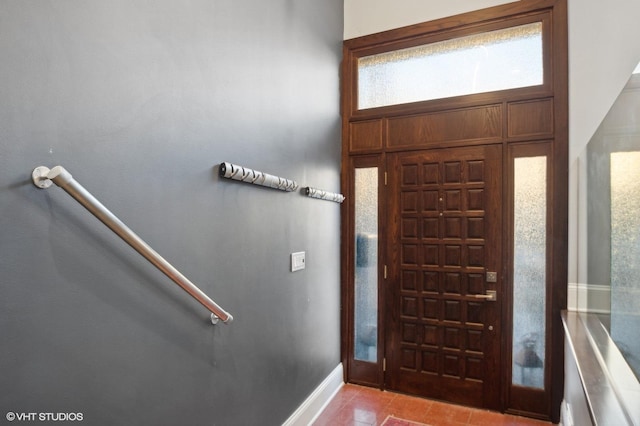 foyer with light tile patterned floors