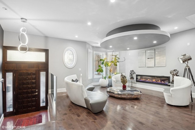 living room featuring dark hardwood / wood-style floors