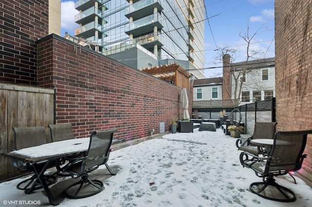 view of yard layered in snow