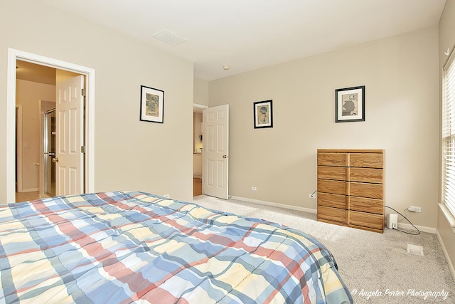 unfurnished bedroom with light colored carpet