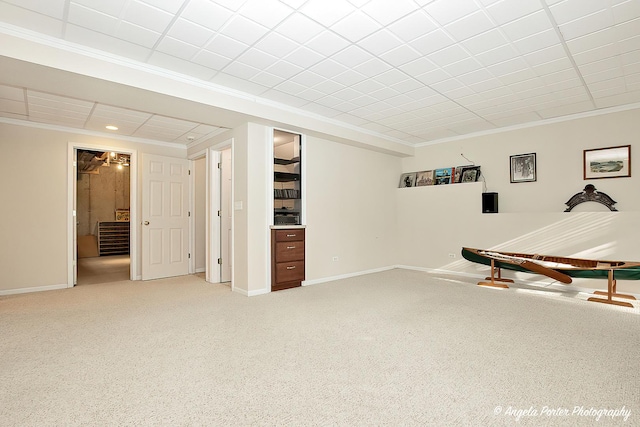 interior space featuring crown molding and carpet floors