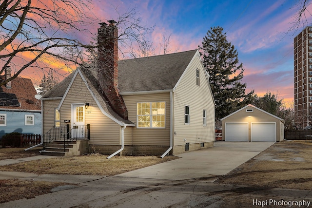 view of front of home with an outbuilding and a garage