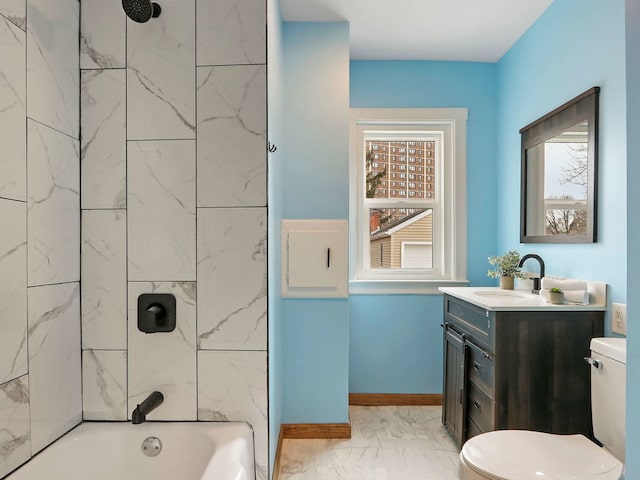 full bathroom featuring vanity, toilet, and tiled shower / bath combo