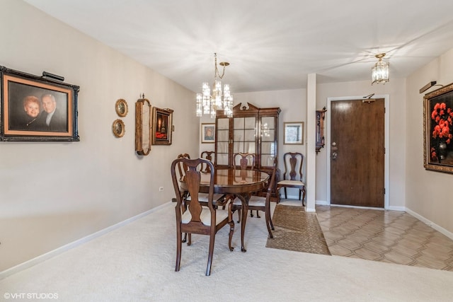 dining room with a notable chandelier