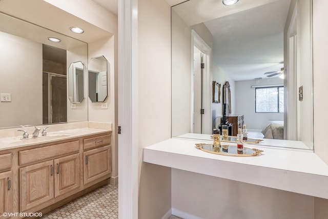 bathroom featuring vanity, tile patterned floors, a shower with door, and ceiling fan