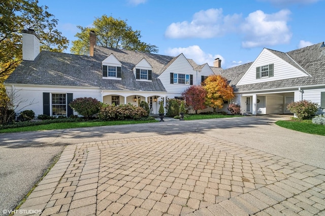 view of new england style home