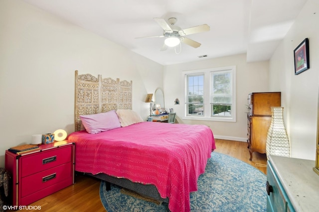 bedroom featuring ceiling fan and light wood-type flooring