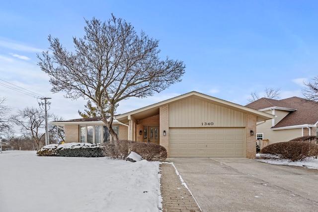 single story home featuring a garage