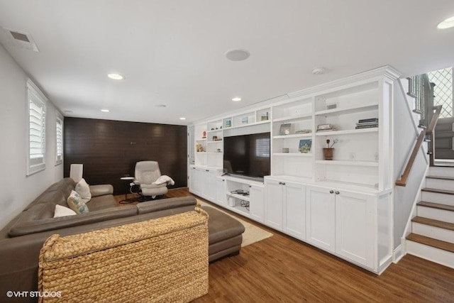 living room with dark hardwood / wood-style floors