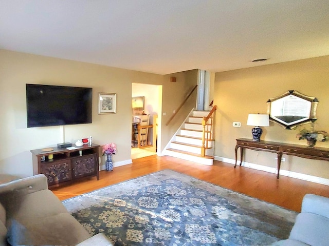 living room with hardwood / wood-style flooring