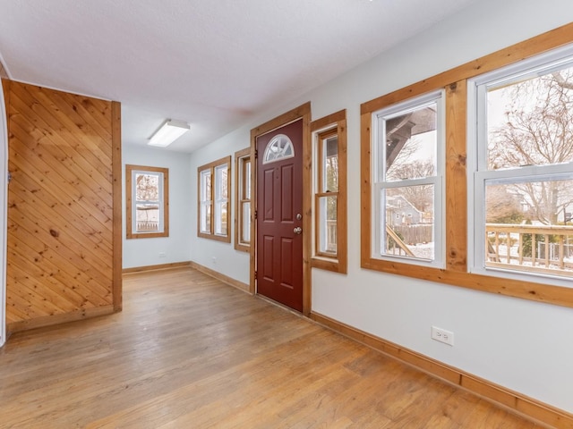 entryway with light hardwood / wood-style flooring