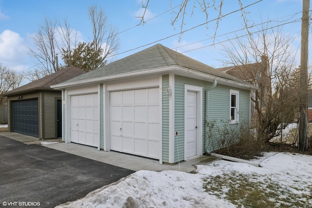 view of snow covered garage