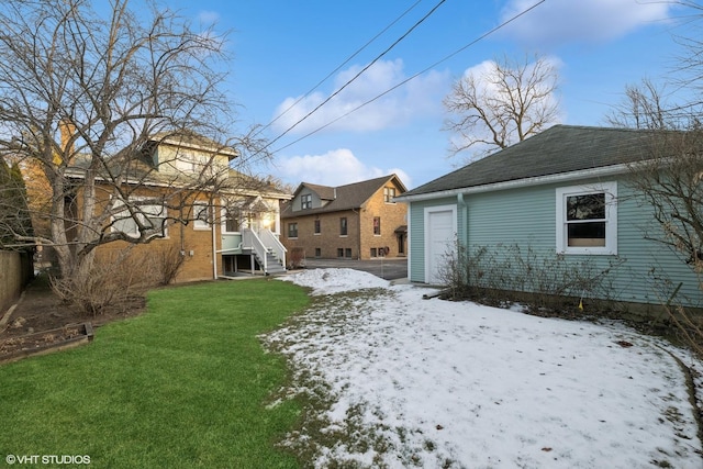 view of yard covered in snow