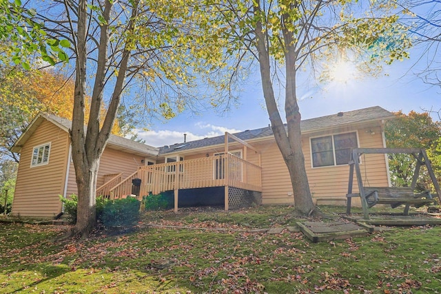 view of side of property with a deck