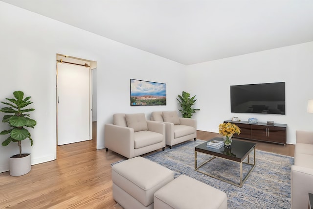 living room with light hardwood / wood-style floors