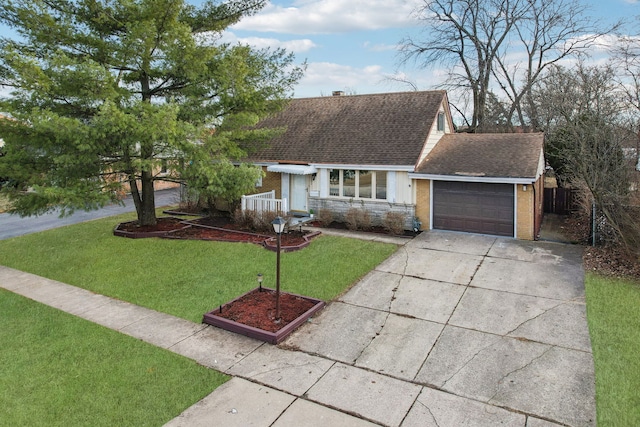 single story home with a garage and a front lawn