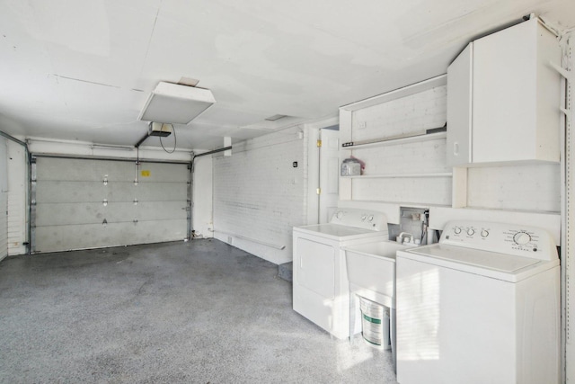 garage with independent washer and dryer