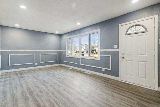 foyer featuring hardwood / wood-style floors