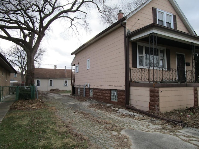 view of home's exterior with a porch