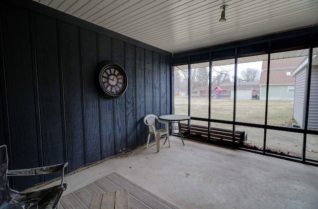 unfurnished sunroom with a wealth of natural light